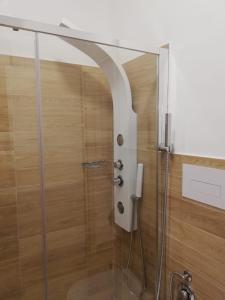 a shower with a glass door in a bathroom at Sicitaly taormina in Taormina +42 photos
