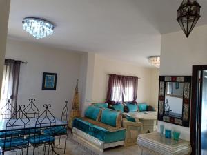 Posezení v ubytování TRIPLEX LA MARINA SAIDIA + 28 fotografií
