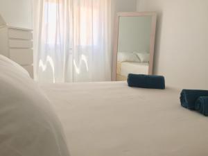 Łóżko lub łóżka w pokoju w obiekcie Casa Luz