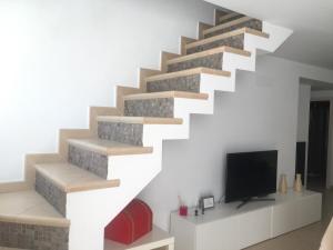 Telewizja i/lub zestaw kina domowego w obiekcie Casa Luz