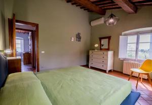 Posteľ alebo postele v izbe v ubytovaní Appartamento con magnifica vista e piscina