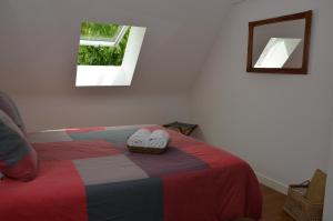 Ein Bett oder Betten in einem Zimmer der Unterkunft LA MAISON DE BIORD