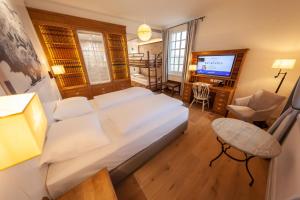 Et tv og/eller underholdning på 4-Sterne Superior Erlebnishotel Krønasår, Europa-Park Erlebnis-Resort