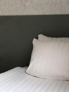 Postel nebo postele na pokoji v ubytování Viktoria Hotell & Konferens