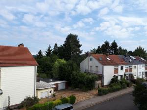 a row of houses in a residential neighbourhood at Bella Casa & Belle Maison in Saarbrücken