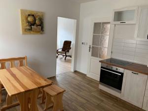 Kuchyň nebo kuchyňský kout v ubytování Apartmány Michaela