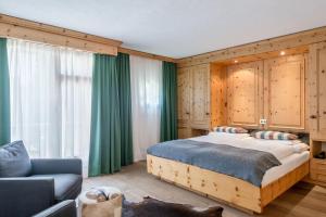 Postel nebo postele na pokoji v ubytování Boutique Hotel Cervus