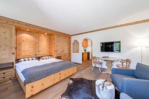 Postel nebo postele na pokoji v ubytování Boutique Hotel Cervus