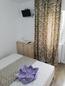 Postel nebo postele na pokoji v ubytování Casa Cristian