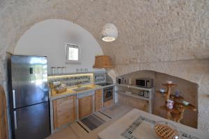 Cucina o angolo cottura di Trulli Santa Croce - Luxury Holiday -