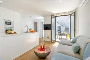 A kitchen or kitchenette at Townhouse Tonina