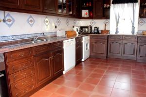 Virtuvė arba virtuvėlė apgyvendinimo įstaigoje Azul Coruche