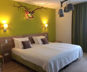 Letto o letti in una camera di Berdorfer Eck - Bed&Breakfast