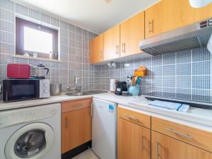A kitchen or kitchenette at Blue apartments LK