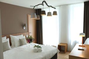 Letto o letti in una camera di Berdorfer Eck - Bed&Breakfast