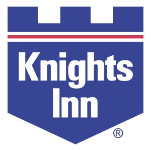 a blue sign with the words knights inn at Knights Inn Colonial Fireside Inn in Pembroke