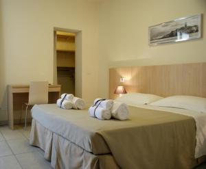 Posteľ alebo postele v izbe v ubytovaní Residence Belmare + 37 fotografií