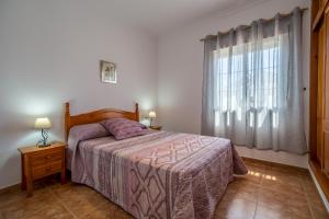 Postel nebo postele na pokoji v ubytování Chalet Miriam I