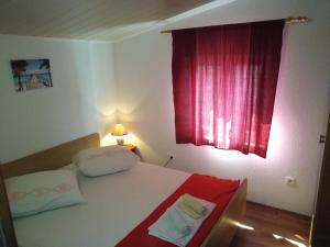 Posteľ alebo postele v izbe v ubytovaní Apartman Rodić