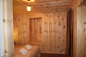 Voodi või voodid majutusasutuse Ecohouse Svaneti toas