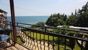 a balcony with a view of the ocean at Briz MK Apartment in Ravda