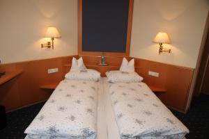 Postel nebo postele na pokoji v ubytování Hotel Anika