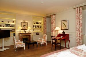 Кровать или кровати в номере Hotel Casa Palmela - Small Luxury Hotels of The World, Hotel & Villas