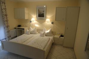 Postel nebo postele na pokoji v ubytování Hotel Anika