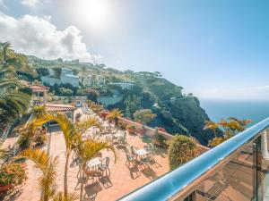 a balcony with a view of the ocean at Ocean Gardens in Funchal