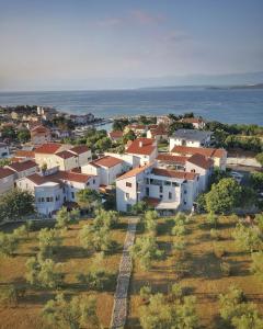an aerial view of a small town with houses at Apartman I&A in Porat