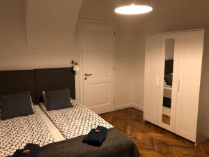 Postel nebo postele na pokoji v ubytování Apartmani SB 42