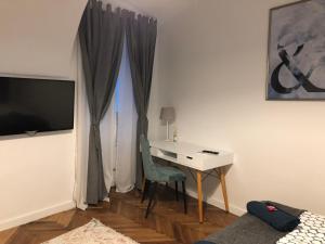TV a/nebo společenská místnost v ubytování Apartmani SB 42