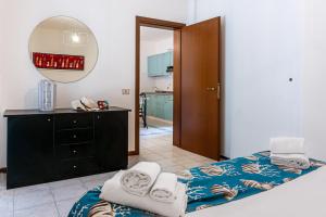 Postel nebo postele na pokoji v ubytování Oleandri Suite Hotel