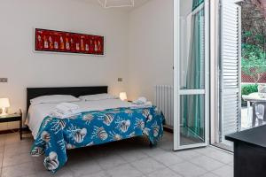 Postel nebo postele na pokoji v ubytování Oleandri Suite Hotel