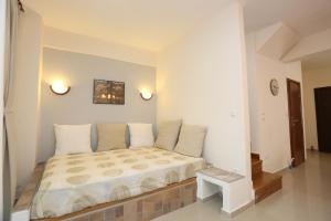 Posteľ alebo postele v izbe v ubytovaní Villa Argo 2 - Beachfront, Big gardens, Location! + 37 fotografií