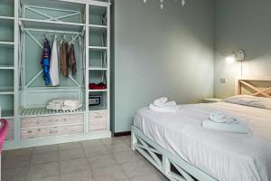 Postel nebo postele na pokoji v ubytování Oleandri Suite Hotel