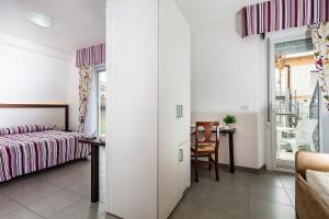 Postel nebo postele na pokoji v ubytování Hotel Vienna