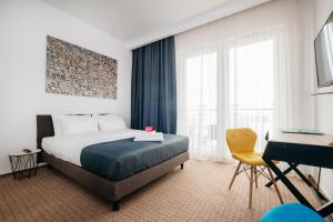 Posteľ alebo postele v izbe v ubytovaní Varsovia Comfort
