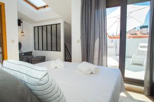 Posteľ alebo postele v izbe v ubytovaní AL27 Duplex de diseño a 250 metros de la playa + 20 fotografií