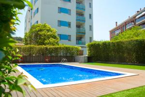 Bazén v ubytovaní AL27 Duplex de diseño a 250 metros de la playa alebo v jeho blízkosti