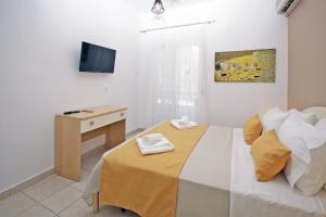 TV a/nebo společenská místnost v ubytování Aqua Marine 2