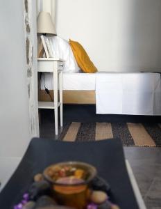 A bed or beds in a room at Studio Panagiota - Oasis holiday houses