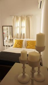 A bed or beds in a room at Studio Panagiota - Oasis holiday houses