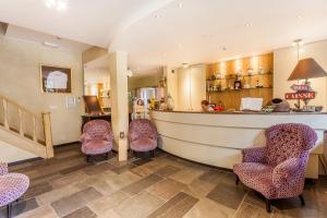 Posezení v ubytování Hotel Fief De Liboichant