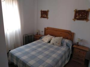 En eller flere senge i et værelse på APARTAMENTO ISLANTILLA