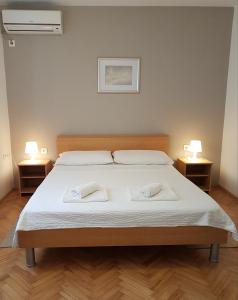 Postel nebo postele na pokoji v ubytování Guesthouse Jet