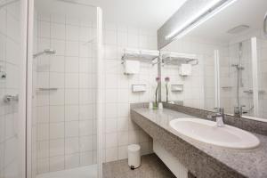 Koupelna v ubytování Hotel Seelust + 37 fotografií