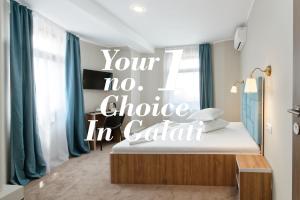 Postel nebo postele na pokoji v ubytování Hotel Bordeaux
