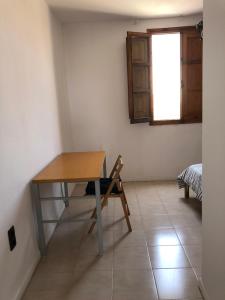 Posteľ alebo postele v izbe v ubytovaní Apartamento Puerto de Sagunto Playa