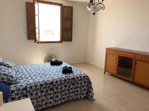 Posteľ alebo postele v izbe v ubytovaní Apartamento Puerto de Sagunto Playa